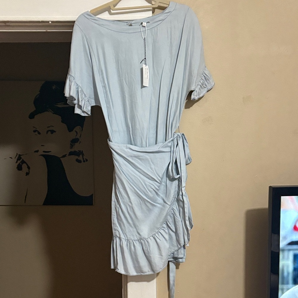 Glam chambray dress with ruffle wrap.